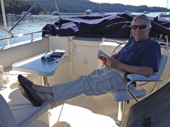 Jim reading on flybridge Jim reading on flybridge