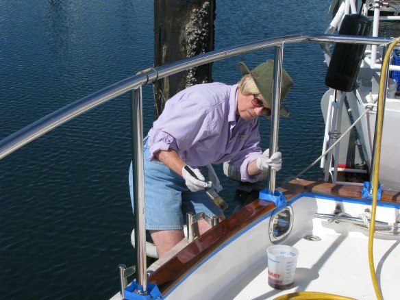 Alice varnishing stern cap rail