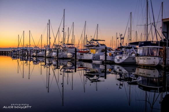 Boat reflections at Anacortes Marina